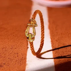 Roland-Garros Bracelets|Bracelets|FRED Force 10 buckle for - Large model 18K yellow gold diamond paved and colored stones
